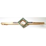 18ct gold brooch set with emeralds, lacking other stones 5.9g. P&P group 1 (£16 for the first item