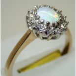 9ct gold, high quality opal and diamond ring, size M/N. P&P group 1 (£16 for the first item and £1.