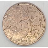 Coin to commemorate the end of WWI (eleventh hour - eleventh day - eleventh month). P&P group 1 (£16