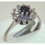 18ct gold, sapphire and diamond cluster ring size N 3.3g. P&P group 1 (£16 for the first item and £