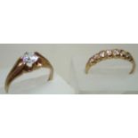 Two 9ct gold rings set with white stones size O. The multi stone ring has one stone turned 4.1g. P&P