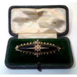 Boxed Georgian/Victorian presumed gold mourning brooch, enamelled with oval glazed panel to the