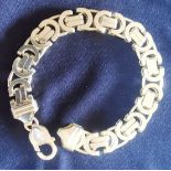 Heavy Silver fancy bracelet marked 925 L: 20 cm 39.3g. P&P group 1 (£16 for the first item and £1.50