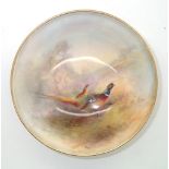 Royal Worcester no. 2769, small painted pheasant bowl signed Jas Stinton D: 10.5 cm. P&P group 1 (£