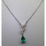 18ct gold emerald and diamond pendant necklace on a 40 cm white 18ct gold chain 3.4g, the diamonds