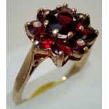 Ladies 9ct gold, garnet cluster ring size L. P&P group 1 (£16 for the first item and £1.50 for