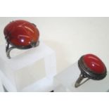 Two silver mounted agate rings size N and L. P&P group 1 (£16 for the first item and £1.50 for