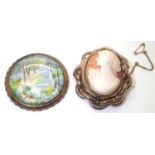 Victorian spinner mourning brooch and a painted example. P&P group 1 (£16 for the first item and £