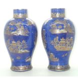 Carlton Ware pair of Kang Hsi design vases of baluster form with painted and gilt Chinoiserie