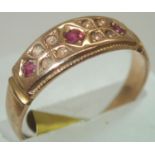 15ct gold and ruby three stone ring size N/O 2.6g. P&P group 1 (£16 for the first item and £1.50 for