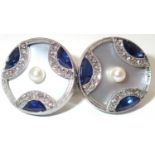 Single presumed 18ct white gold sapphire and diamond cufflink 6.4g. D: 13 mm Condition Report: