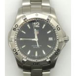 Tag Heuer Aquaracer gents stainless steel wristwatch with black dial. Recently serviced in