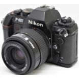 Nikon F-501 35mm film camera with AF Nikkor 35 - 70 zoom lens. P&P group 2 (£20 for the first item