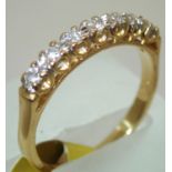 18ct yellow gold seven stone diamond ring. P&P group 1 (£16 for the first item and £1.50 for