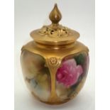 Royal Worcester painted and gilt covered pot decorated with roses H: 13 cm. P&P group 1 (£16 for the
