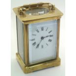 Brass cased carriage clock. Working at lotting up H: 11 cm. P&P group 1 (16 for the first item