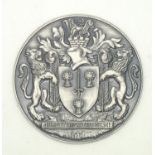 White metal presumed silver Cheshire county plaque "By The Right And Dignity Of The Sword" D: 52 mm.