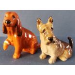 Two Royal Doulton Dogs to include: Cocker Spaniel - No. K9A in gloss - 2.5" Cairn Terrier - No K11