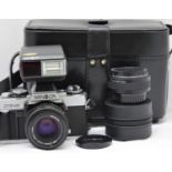 Minolta XG-M Camera with Minolta MD 50mm f1.7 lens; 2x teleconverter; Minolta Program 1800 Flash