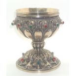 19thC continental silver gilt and white metal ecclesiastical chalice set with red and green