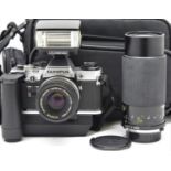 Olympus OM10 silver body; Olympus Winder 2 Motor Drive; Zuiko 50mm f1.8 lens; Olympus T20 flash gun;