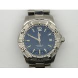 Tag Heuer Aquaracer 300m gents stainless steel wristwatch with blue dial. Recent service in black