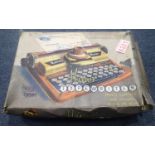 Boxed Mettoy toy minor typewriter. P&P Group 1 (£14+VAT for the first lot and £1+VAT for