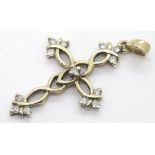 Ladies 9ct gold fancy thirteen stone diamond set cross. P&P Group 1 (£14+VAT for the first lot