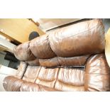 Large brown leather three piece settee. This lot is not available for in-house P&P, please contact