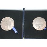 Two cased limited edition Western Union bronze table medals. P&P Group 1 (£14+VAT for the first
