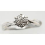 Ladies 18ct white gold fancy cluster ring, size M, 2.7g. P&P Group 1 (£14+VAT for the first lot