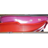 Two plastic moulded childrens sledges. This lot is not available for in-house P&P, please contact