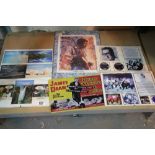 Collection of reproduction advertising posters and a Guinness postcard display. P&P Group 1 (£14+VAT