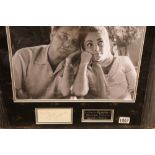 Elizabeth Taylor and Richard Burton signatures in a large framed montage, 62 x 69 cm, with online