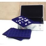 An aluminium coin collectors case with several lift out trays for differing sized coins P&P group