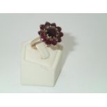 Large 9ct gold garnet set flower-head cluster ring, D: 19 mm, size P, 5.3g P&P group 1 (£16 for