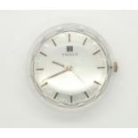 Tissot 17 jewel wristwatch face and movement only. Working at lotting. P&P group 1 (£16 for the