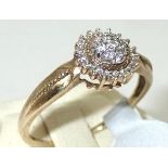 Ladies 9ct gold, diamond cluster ring Size R 2.5g P&P group 1 (£16 for the first item and £1.50