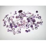 Loose gemstones: Amethyst and amethyst coloured stones, largest stone weighing 8.45cts gross