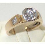 18ct gold and diamond .5cts solitaire ring with princess cut diamond set shoulders, size M/N 6.5g