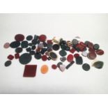 Loose gemstones: Bloodstone and carnelian panels, largest weighing 22.65cts, 22mm x 22mm gross