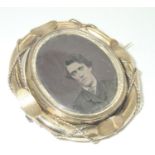 Antique pinchbeck swivel mourning brooch with photograph P&P group 1 (£16 for the first item and £