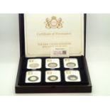 Boxed Datestamp full twelve coin proof set for 2014 in a hardwood presentation box with