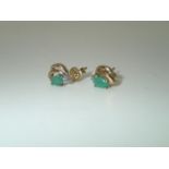 Pair of 9ct gold emerald and diamond earrings, 1.0g P&P group 1 (£16 for the first item and £1.50