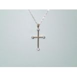 9ct gold and diamond cross pendant on a 9ct gold chain, 1.6g P&P group 1 (£16 for the first item and