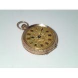15ct gold ladies open faced fob watch, lacking glass, gross weight 29.2g P&P group 1 (£16 for the