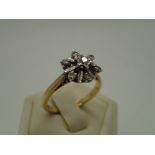 18ct gold starburst diamond ring, size L, 3.8g P&P group 1 (£16 for the first item and £1.50 for