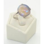 Vintage presumed platinum ring set with a large circular opal, size R, 3.6g P&P group 1 (£16 for the