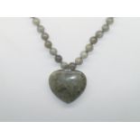 Jade type hardstone bead necklace with a large heart shaped pendant with a sterling silver clasp, L: