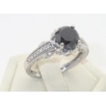 9ct white gold large black diamond solitaire ring with diamond set shoulders, size K, 2.7g diamond